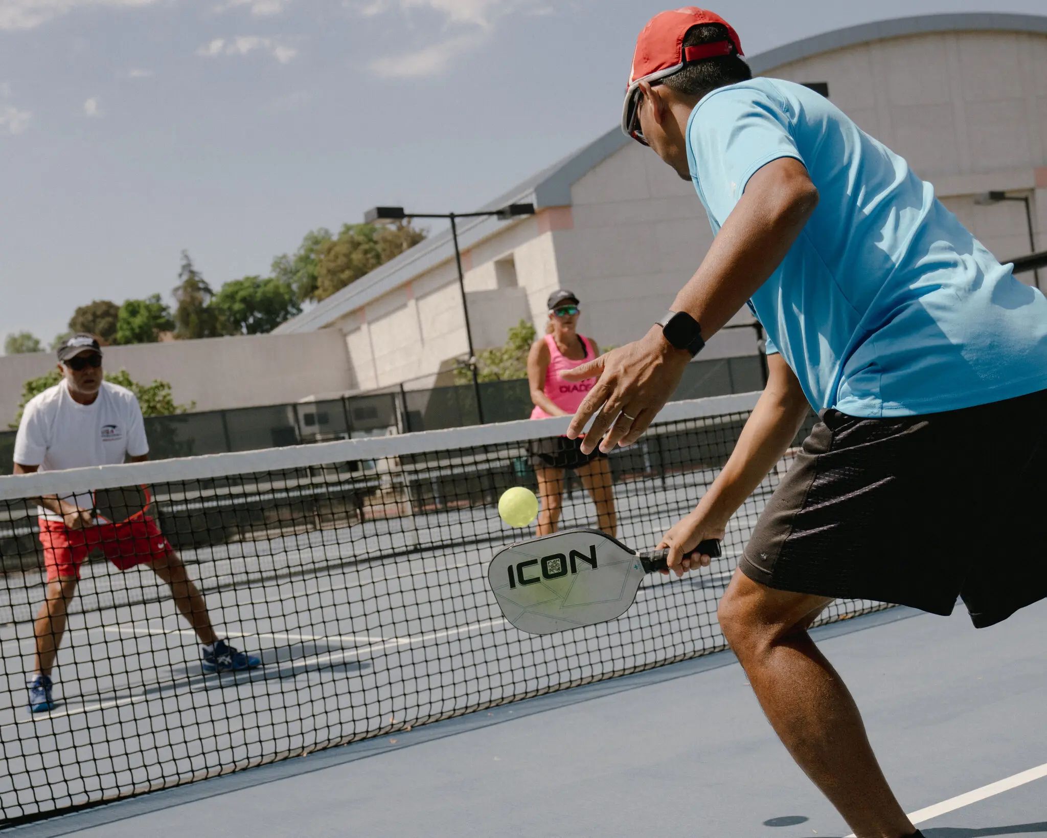 People playing pickleball to stay active and mobile.